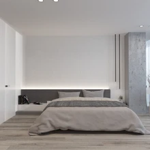 Magamistuba lubab mõjule pääseda erinevate materjalide tekstuuridel: siin kohtab jõulist betooni, aga ka puitu ja tekstiile.